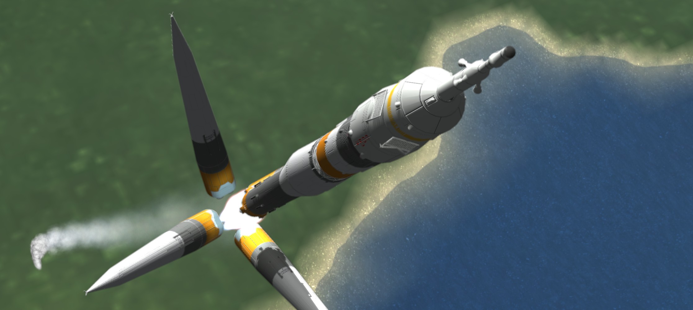 Une fusée Soyouz qui largue ses boosters après le décollage.